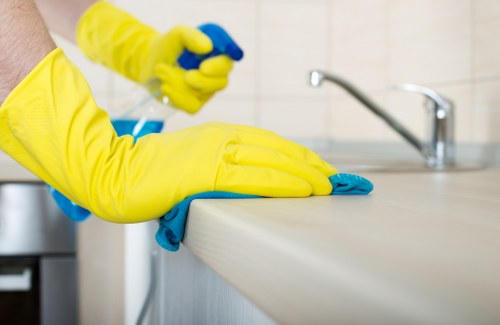 Commercial cleaner in Kensington preparing an office space